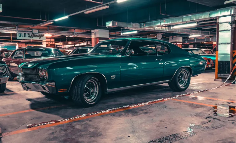 Vintage classic car parked in an underground garage
