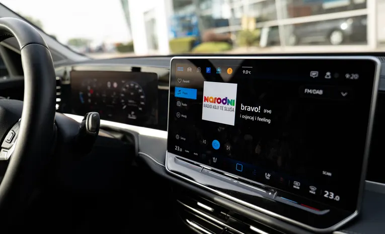 Modern car dashboard display representing engine and reliability data