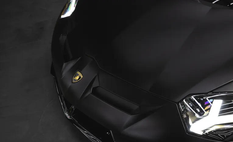 Close-up of a matte finish vinyl wrapped vehicle showing wrap texture